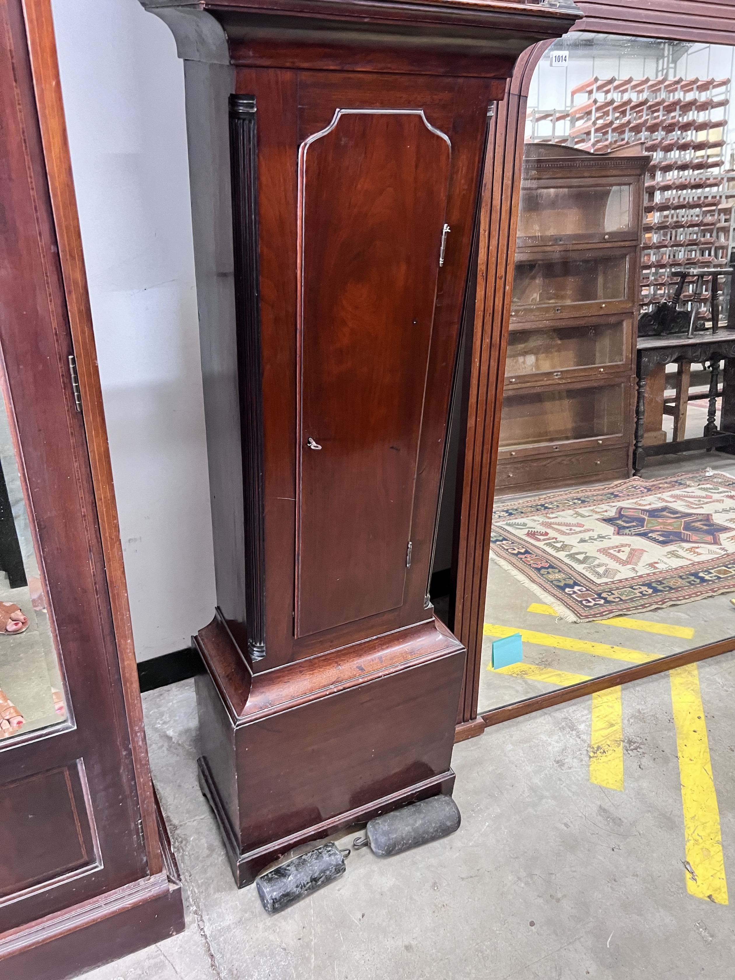 A George III mahogany eight day longcase clock, the arched dial marked John Watt Irvine, height 222cm